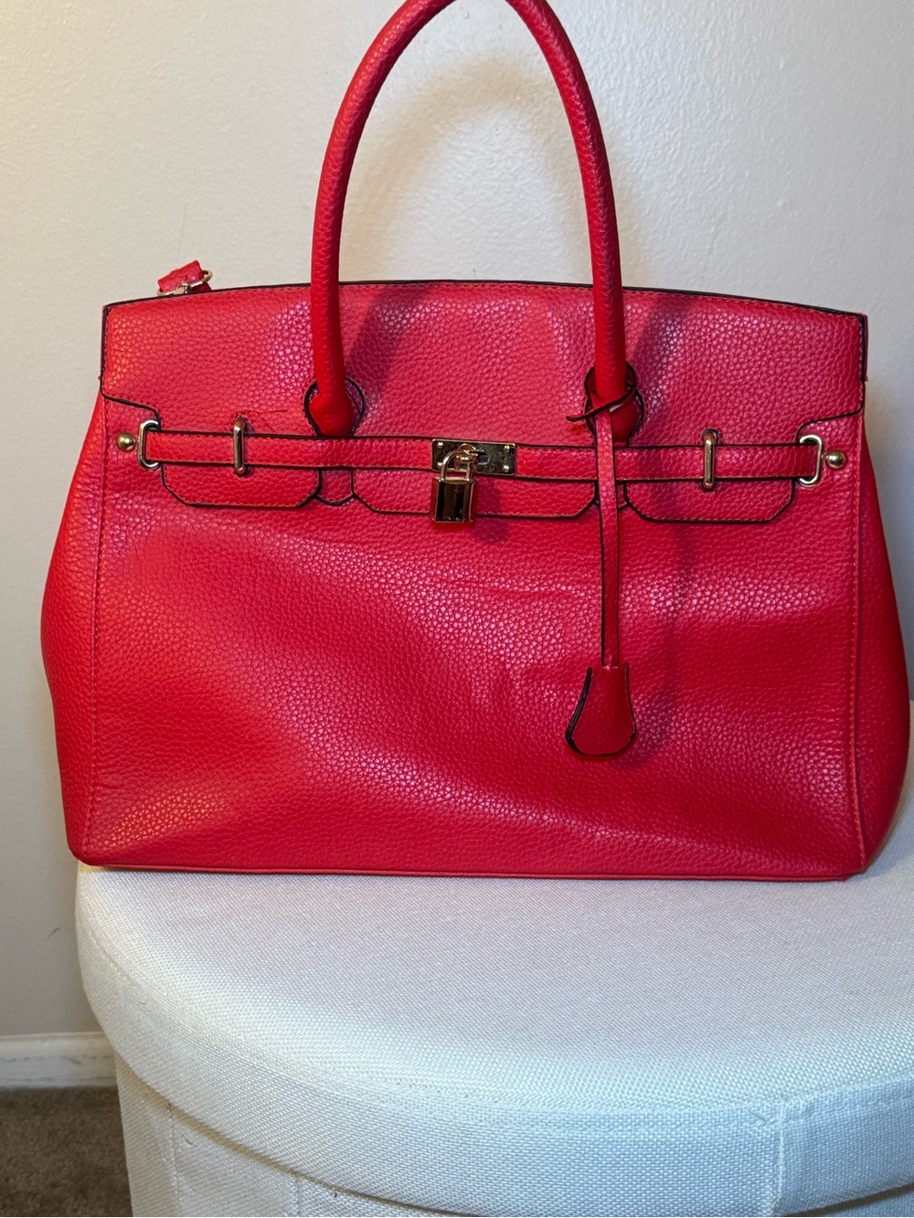 Chic Red Pebbled Tote with Gold Lock Detail - Classic Top Handle Style